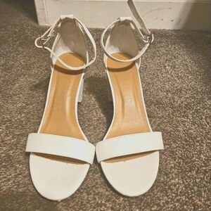 White heeled sandals